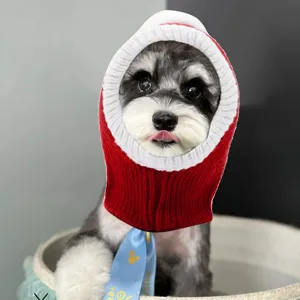 Cute red white knitted pet hat for dogs and cats, warm holiday headwear costume accessory.