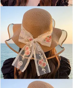 Femme chapeau de paille ruban floral large bord plage vacances ete elegant chic