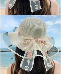 Chapeau de paille femme été à large bord avec ruban broderie florale et nœud de plage