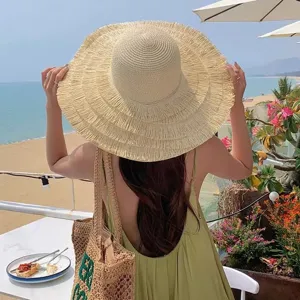 Womens large brim straw hat for summer beach vacation, foldable sun protection sunshade hat.