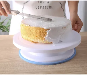 Plastic cake turntable with non-slip base for smooth baking and decorating tasks.
