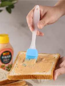 Silicone oil brush for baking and cooking, flexible kitchen tool for spreading sauce easily.