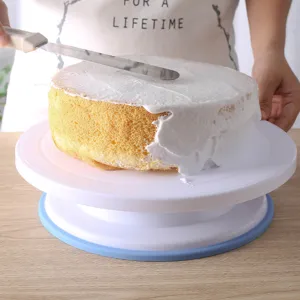 Plastic cake decorating turntable with non-slip base for baking and frosting birthday cakes.