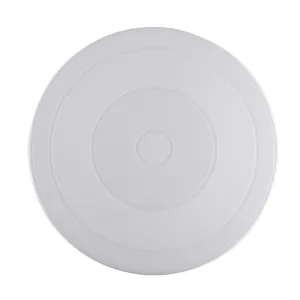 White plastic cake turntable rotating pastry stand for baking, decorating cakes and desserts.