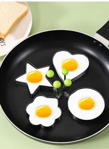 Stainless steel fried egg mold kitchen tool detailed view with cute shapes and handle.