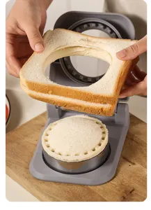 Gros plan détaillé du coupe-sandwich à ressort montrant la découpe des bords et le scellement.