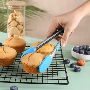 Petite pince de cuisine en silicone pour cuisiner, cuire, barbecues et servir du pain.