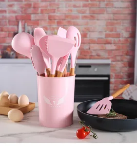 Magnifique set d'ustensiles de cuisine en silicone rose avec manches en bois, 12 pcs.