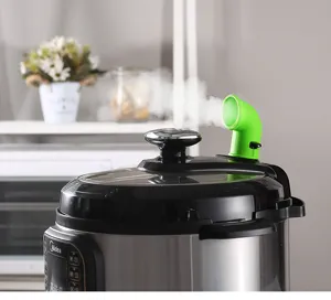 Silicone steam release diverter accessory for pressure cooker, green steam guide tube detail view.