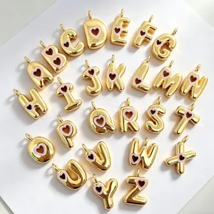 Ciondoli lettere alfabeto placcati in oro con cuore rosa, charms da A a Z per creare gioielli.