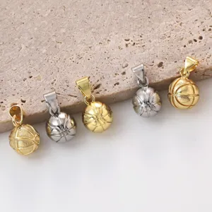 Detailed close-up of gold and silver basketball pendants showing fine textured metal design.