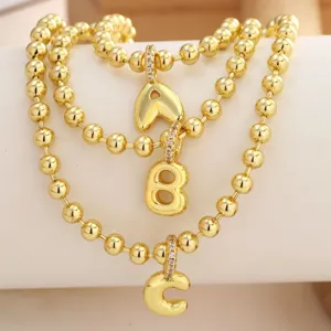 Gold plated bubble letter and number pendant bead chain necklace set for DIY jewelry making accessories.
