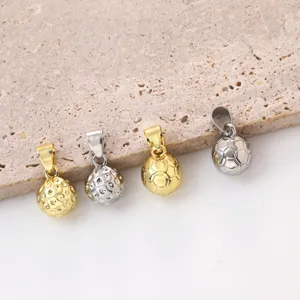 Detailed view of sports ball pendants featuring gold and silver golf and soccer designs.