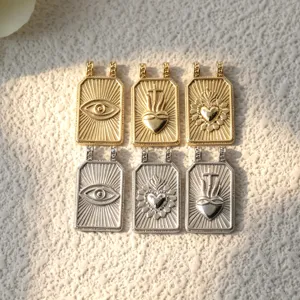 Colgantes de metal de ojo malvado y corazón sagrado dorado plateado accesorios de joyería DIY
