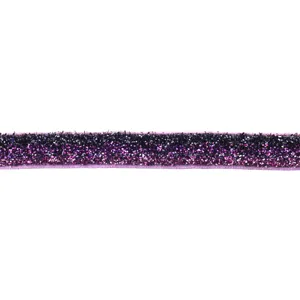 Glitter velvet ribbon detail shot, sparkling metallic threads texture, close-up craft supply.