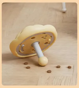 Interactive pet slow feeder toy, cute yellow mushroom puzzle design with treat dispensing function.