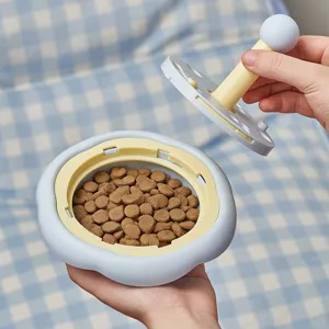 Interactive pet slow feeder toy, cute flower shape puzzle feeder for cats and dogs with food storage.