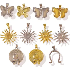 Großhandel Messing Metall Anhänger mit Schmetterling Sonne und Hut Motiven in Gold und Silber.