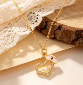 Exquisite 18K gold plated heart nurse cap necklace with sparkling crystals, elegant fashion jewelry.