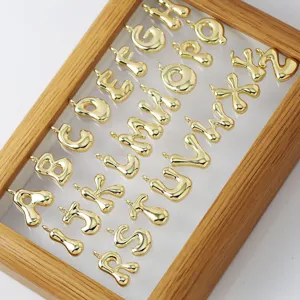 Gold puffy letter pendants, alphabet charms, cute 3D bubble design for DIY jewelry making.