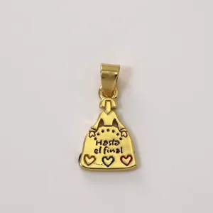 Gold brass enamel pendant detail showing Spanish text engraving and colorful heart accents.