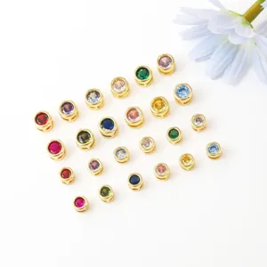 Detailed view of colorful birthstone DIY charm beads, 18K gold plated copper zirconia jewelry.