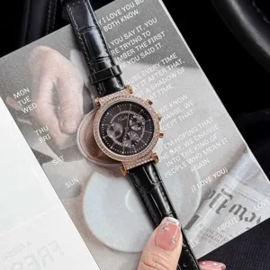 Close-up of Scottie rose gold diamond bezel watch with black crocodile leather strap