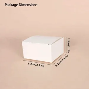 Detailed view of a white miniature dollhouse packaging gift box with 8.2x8.2x5.5cm dimensions