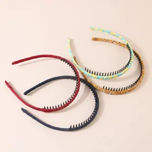 Set di quattro eleganti cerchietti per capelli con denti antiscivolo in vari colori