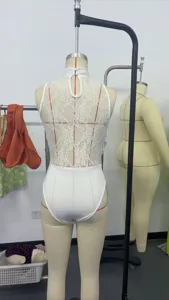 White sleeveless halter neck bodysuit featuring a detailed sheer floral lace back