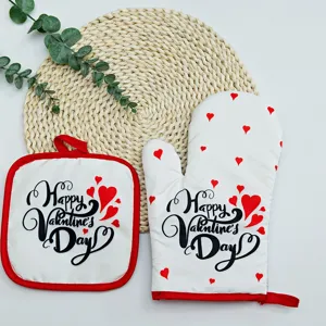 Valentine's Day heat resistant oven mitt and pot holder set with red hearts pattern