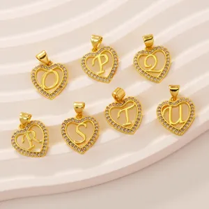 Gold plated brass heart letter pendant detail showing rhinestone paved custom initial jewelry charms.