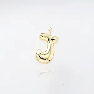 Gold puffy letter J pendant detail, glossy metal initial charm for custom DIY necklaces.