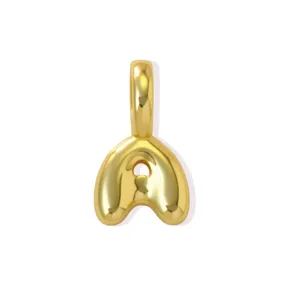 Gold-plated letter A pendant detail close-up, puffy balloon style metal DIY jewelry accessory.