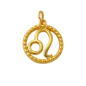 Close-up detail shot of the golden zodiac Leo constellation pendant with beaded rim design.