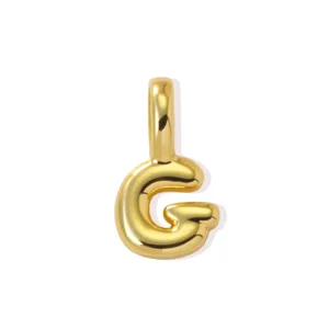 Close-up detail of the 18K gold plated letter G brass pendant, ideal for DIY necklace.