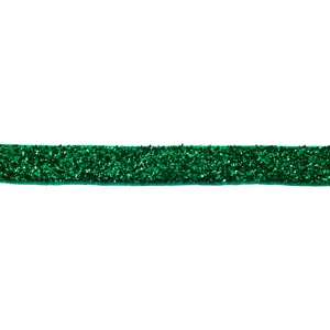 Detail shot of green glitter velvet ribbon, perfect for DIY hair bows and craft accessories.
