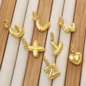 Wholesale 18K gold plated puffy letter charms with cubic zirconia bails for DIY jewelry making.