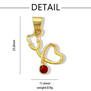 Gold stethoscope pendant with red enamel, nurse medical themed DIY jewelry accessory detail.