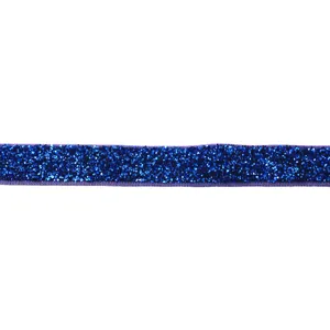Close-up detail of brilliant blue glitter elastic ribbon for DIY hair accessories and bows.