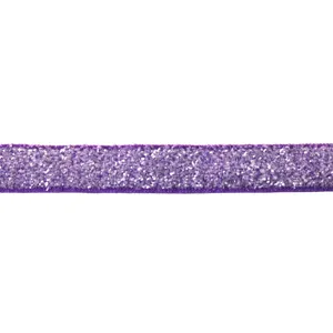 Macro detail view of purple glitter velvet ribbon, ideal for DIY hair bows and craft projects.