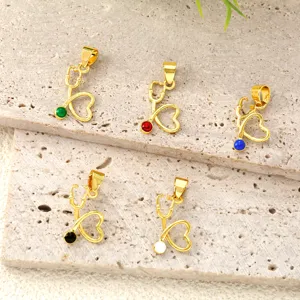 Gold stethoscope pendants set with colorful oil drops, ideal for DIY necklaces and bracelets.