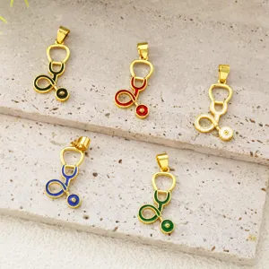 Close-up detail of colorful stethoscope pendants, copper enamel DIY jewelry accessories for necklaces.