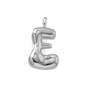 Puffy letter E pendant detail shot, silver tone cute fashion jewelry accessory.