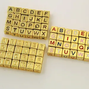 Gold square alphabet beads, enameled letter charms for DIY jewelry making, bracelets and necklaces.