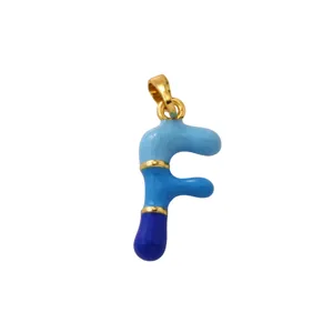 Close-up detail of the colorful enamel letter F pendant, showing vibrant blue gradient tones.