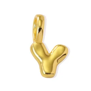 Gold letter Y pendant close-up, 18k gold plated brass charm for DIY jewelry crafting.