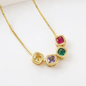 Gold plated brass necklace with colorful square cubic zirconia birthstone pendants for women.