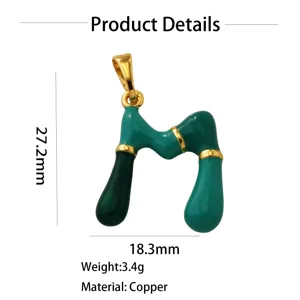 Green enamel letter M pendant, hip-hop style 18K gold plated copper jewelry detail view.