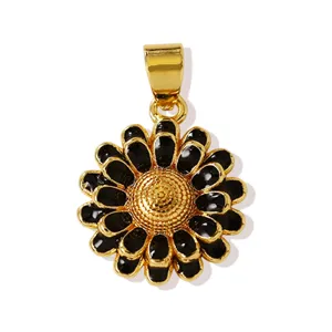 Detailed close-up of a gold-plated copper sunflower pendant with stylish black enamel.